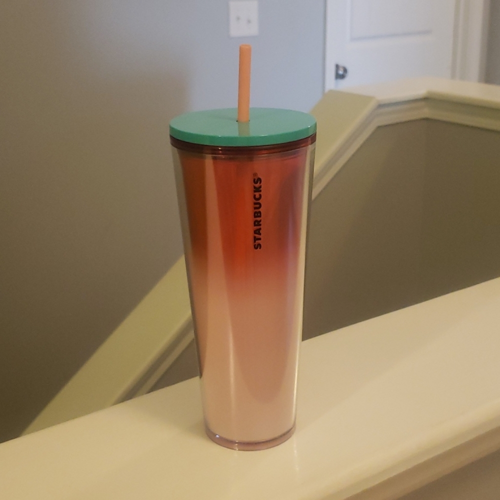 Starbucks red, pink, and green tumbler